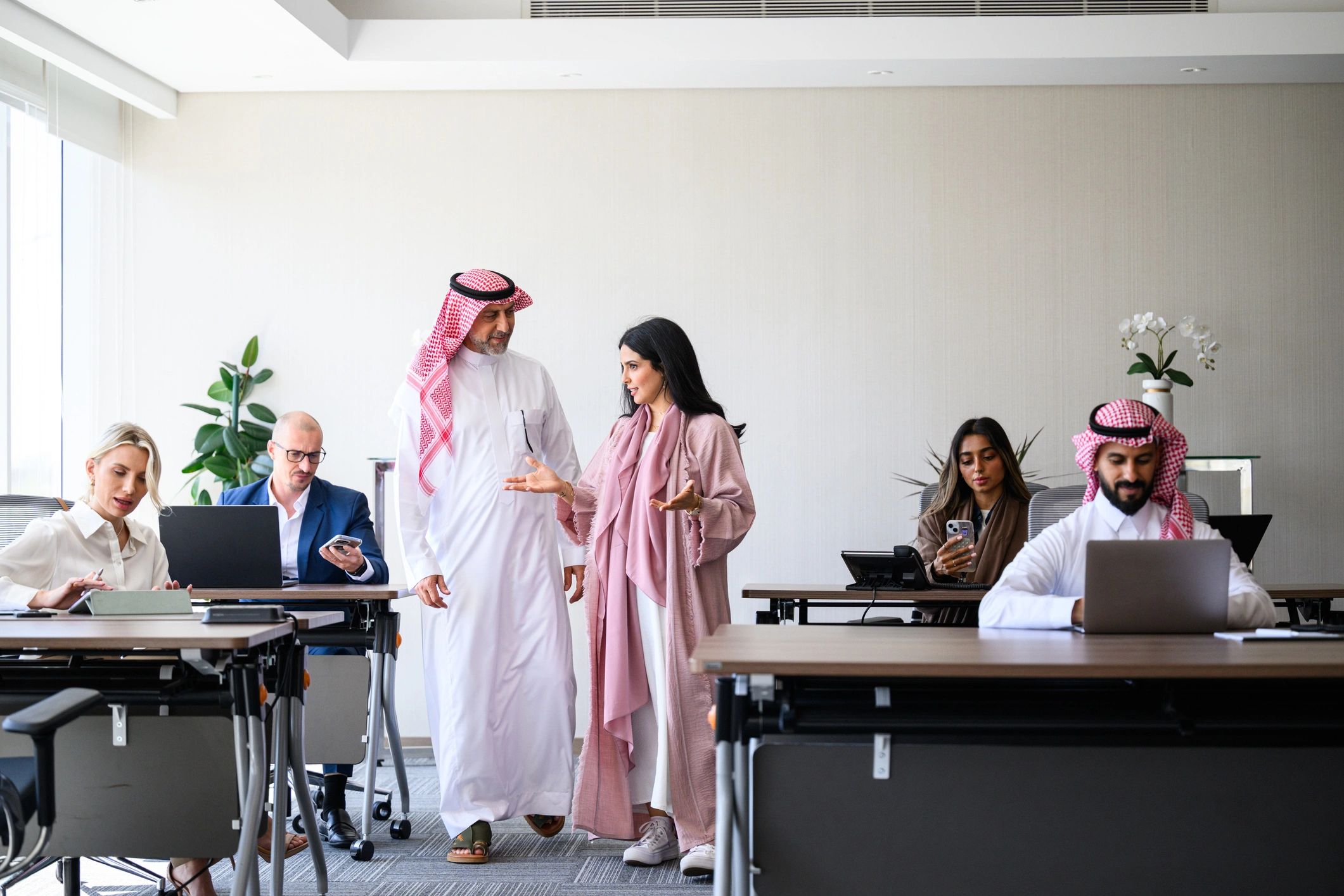 Multicultural business team collaborating in a global office