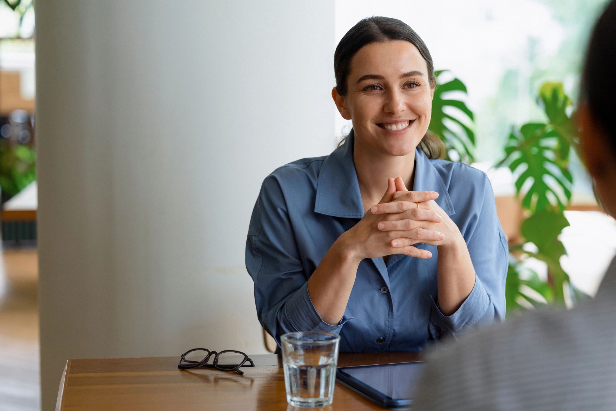Professional receiving career coaching in an office